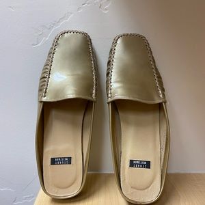 Gold patented leather shoes